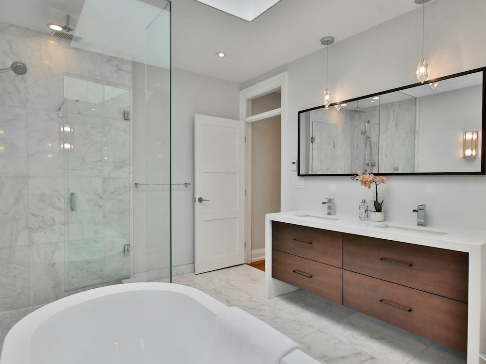 Bright remodeled bathroom with freestanding tub (illustrative photo)