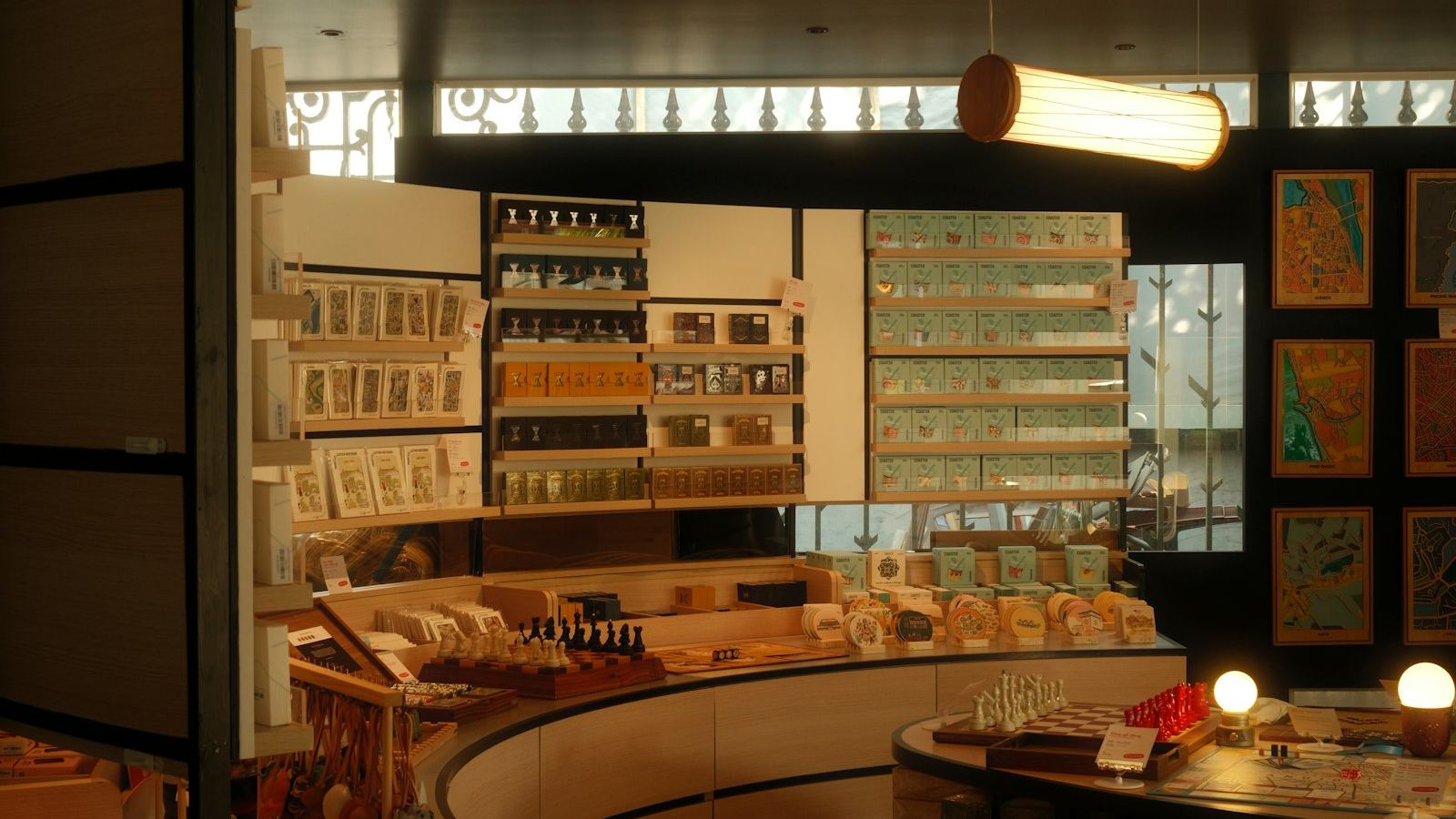 Warmly lit gift shop with wooden shelves and counters (illustrative photo)