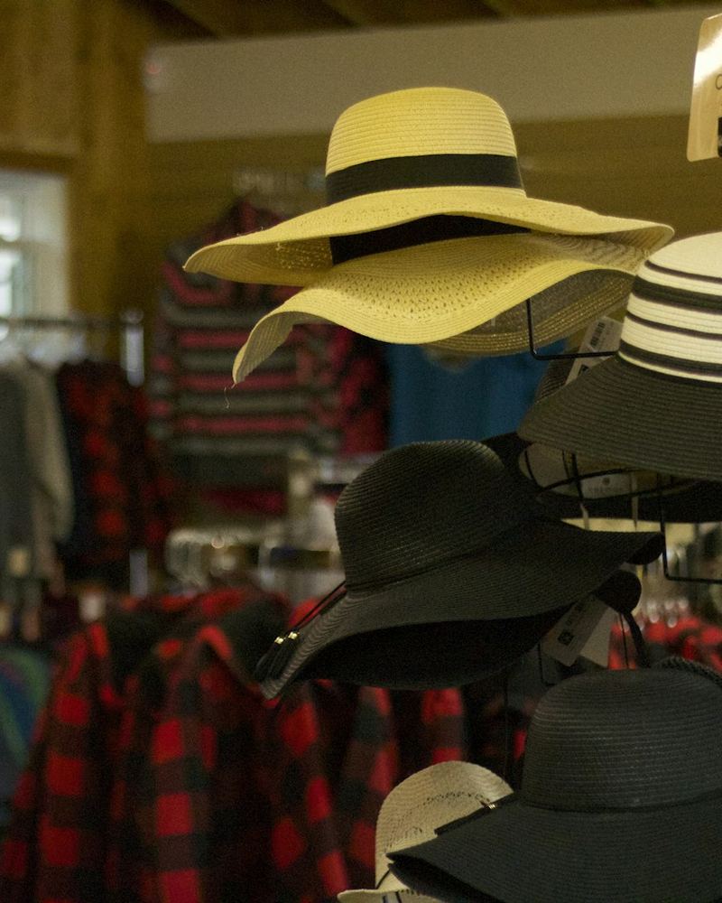 Hats and flannel shirts on a display (illustrative photo)